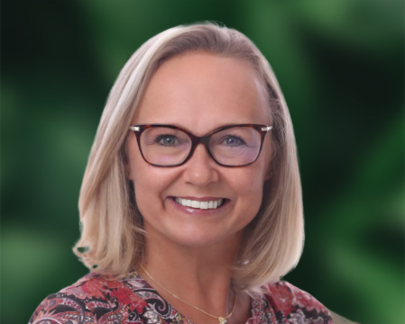 Kelly Kinsey on green and black background